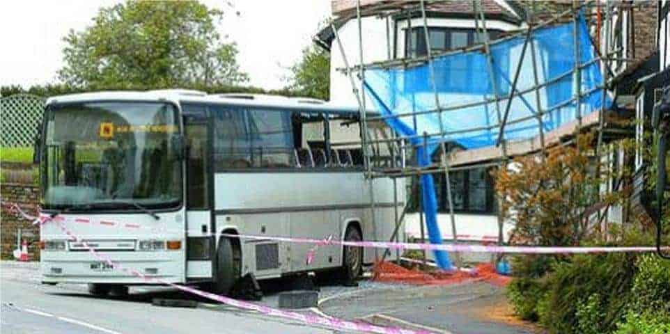 School bus crashes into scaffolding