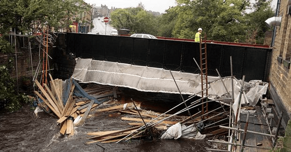 Rising river water wipes out scaffolding on bridge