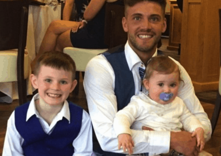 Image of scaffolder Josh Holmes with his children, Josh has been left paralysed after a motocross accident