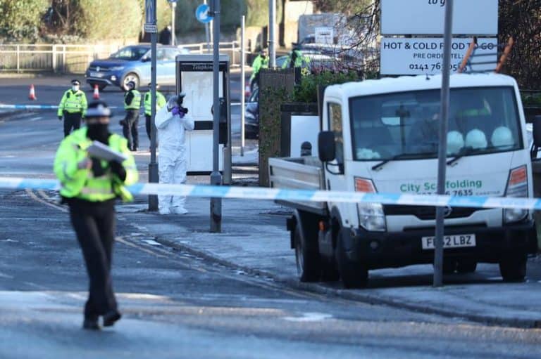 A boss of a Glasgow scaffolding firm and his employee have been wounded after being caught up in an early morning gun attack.