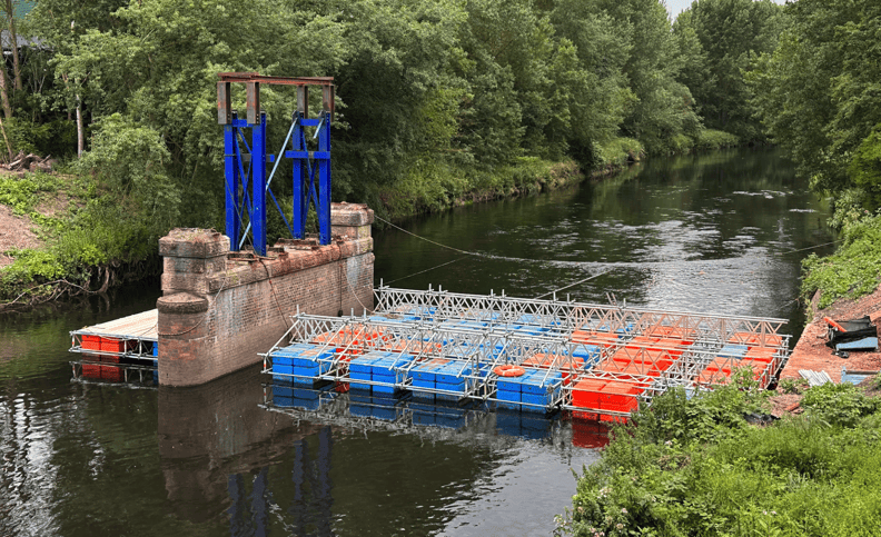 In an industry-first, specialist contractors have utilised a floating bridge crafted entirely from standard scaffolding to complete the demolition of the Hams Hall Bridge over the River Tame in Birmingham.