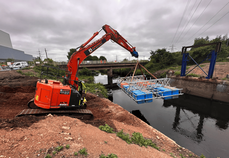 In an industry-first, specialist contractors have utilised a floating bridge crafted entirely from standard scaffolding to complete the demolition of the Hams Hall Bridge over the River Tame in Birmingham.