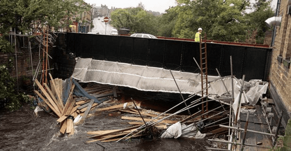 Rising river water wipes out scaffolding on bridge | ScaffMag.com