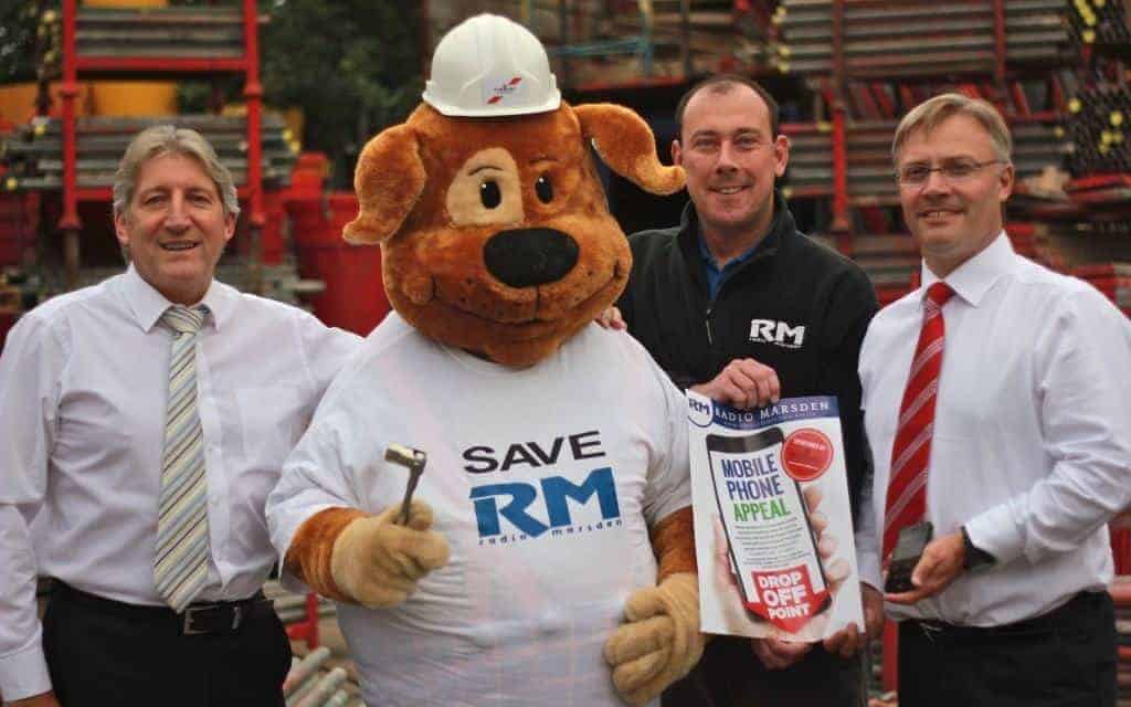 Pictured from left to right: Formark Scaffolding Managing Director Mark Coote, Radio Marsden Bear, Radio Marsden Chairman Jason Reynolds and Formark Scaffolding Finance Director Mark Endersby.