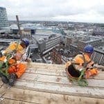 scaffolders working on stephenson tower above public exclusion zone