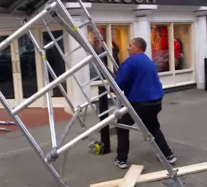 Video: 30ft Mobile scaffolding tower crashes down onto busy street