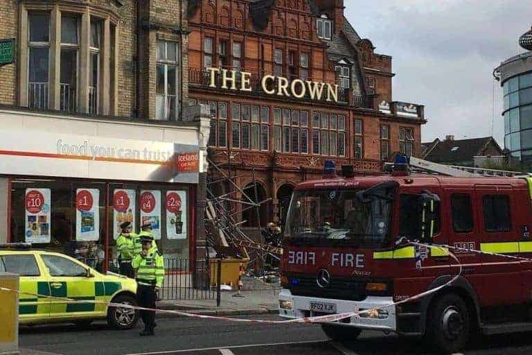 Two injured as scaffolding collapses in London street