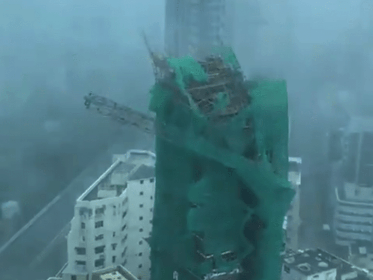 Video: High rise scaffolding falls as typhoon rips through Hong Kong
