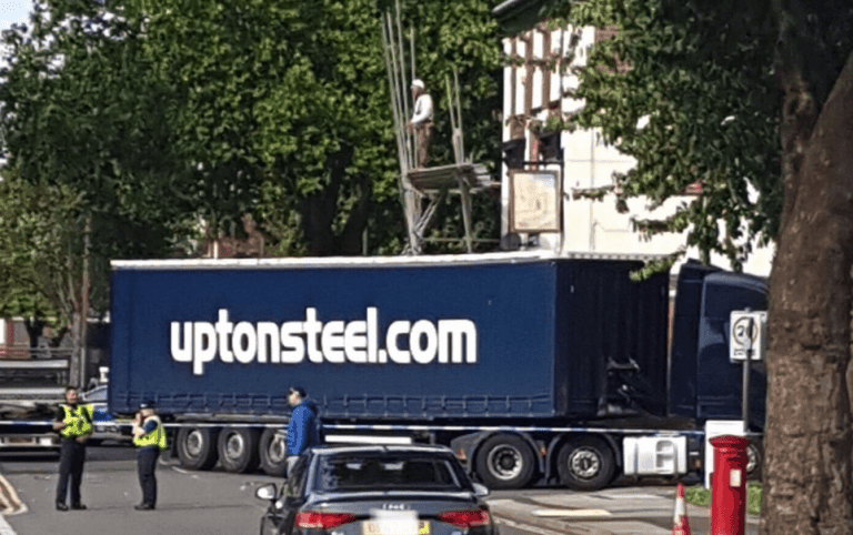 Scaffolder stranded after HGV smashes into pub scaffolding