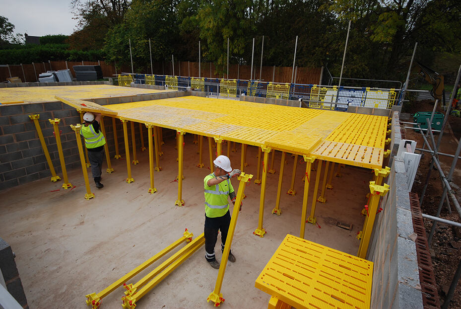 Workers erecting TRAD Deck