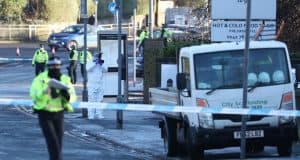 A boss of a Glasgow scaffolding firm and his employee have been wounded after being caught up in an early morning gun attack.
