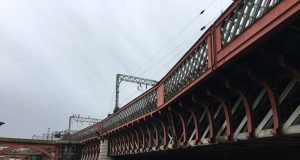 A warning has been issued by Network Rail after a scaffolder plunged into a river in Glasgow while dismantling a scaffold over water.