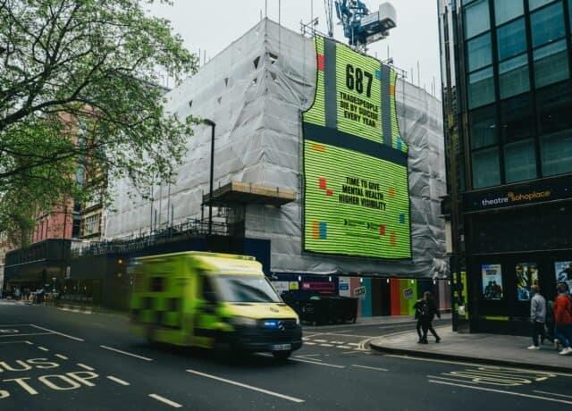 A towering 12-metre-tall mural comprising 687 high-vis vests, representing the yearly average of suicide deaths among UK tradespeople, has been unveiled in London's West End.