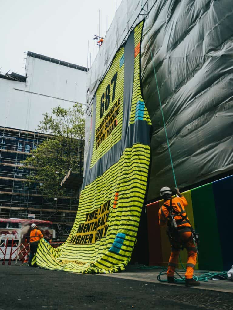 The mural was revealed to coincide with Mental Health Awareness Week amidst alarming government statistics showing an average of 687 tradespeople, almost twice per day, die by suicide each year.