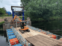 In an industry-first, specialist contractors have utilised a floating bridge crafted entirely from standard scaffolding to complete the demolition of the Hams Hall Bridge over the River Tame in Birmingham.