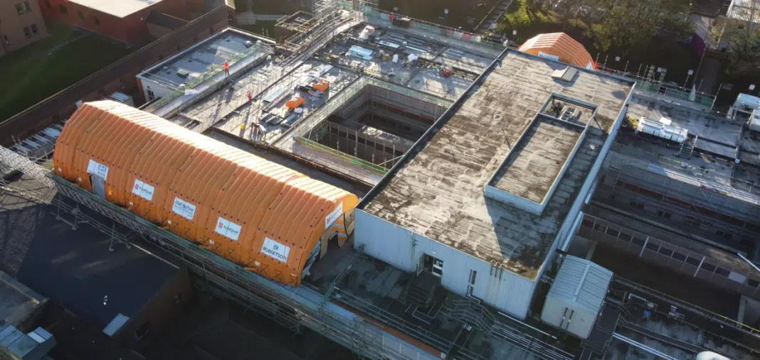 Inflatable roofing tents have been deployed during a £38m redevelopment at Royal Bolton Hospital, supporting complex RAAC roof replacement works while keeping the site operational.